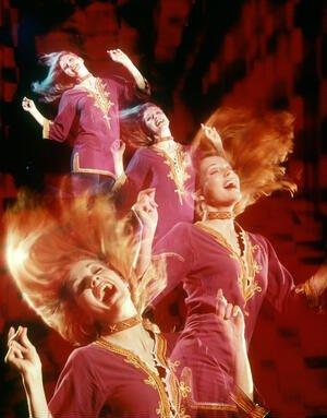 1960s 1970s multiple exposure woman wearing purple dashiki wildly dancing to disco dance music | lena designs studio